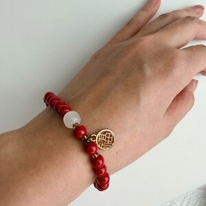 Elegant Red Beaded Bracelet with Gold Charm